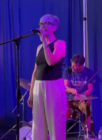 Local singer performing with the house band
