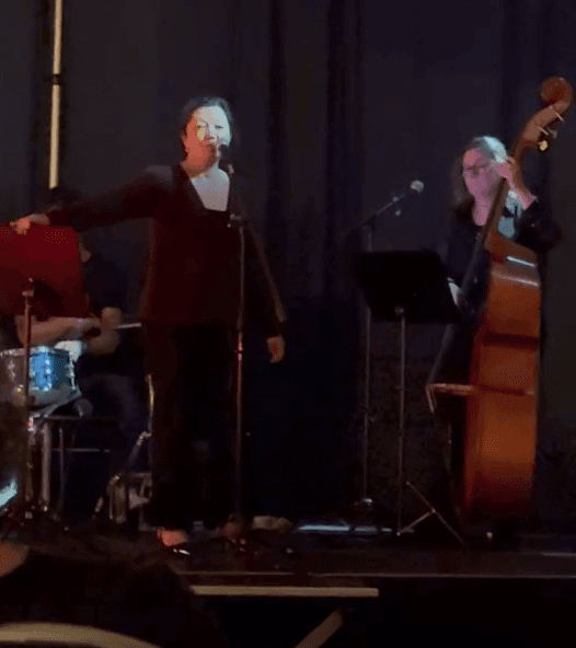 Local singer performing with the double bass player