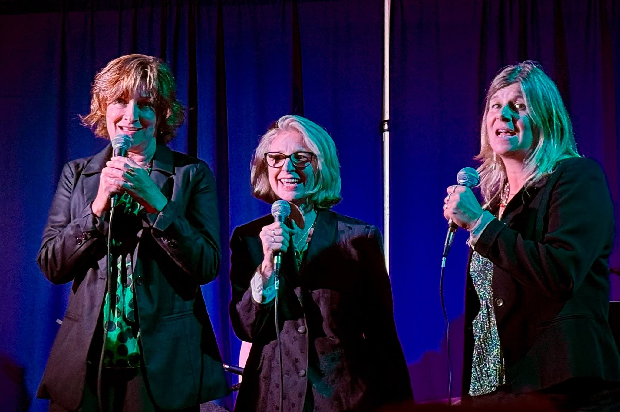 Three local singers performing together