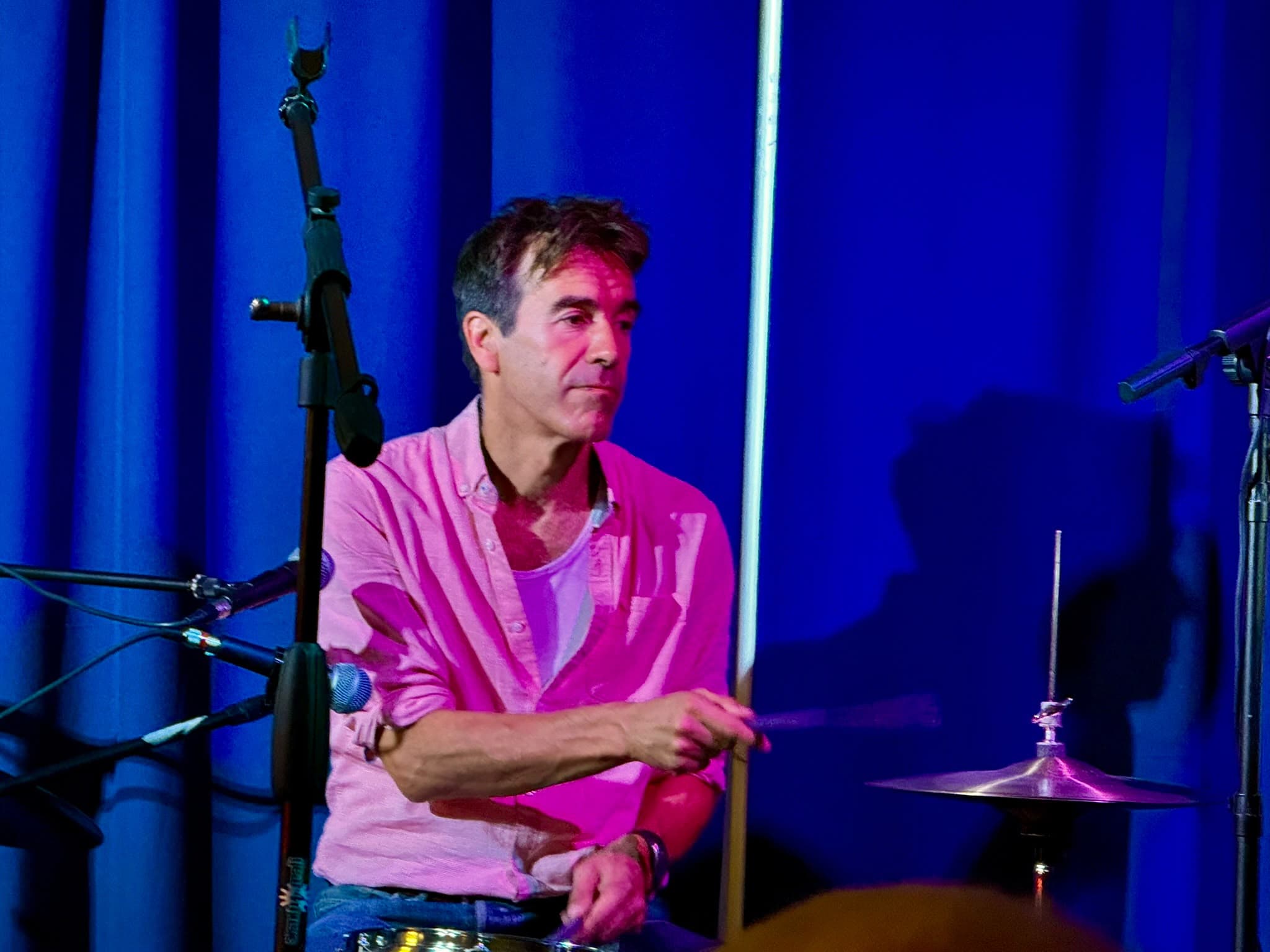 The house band drummer performing on stage