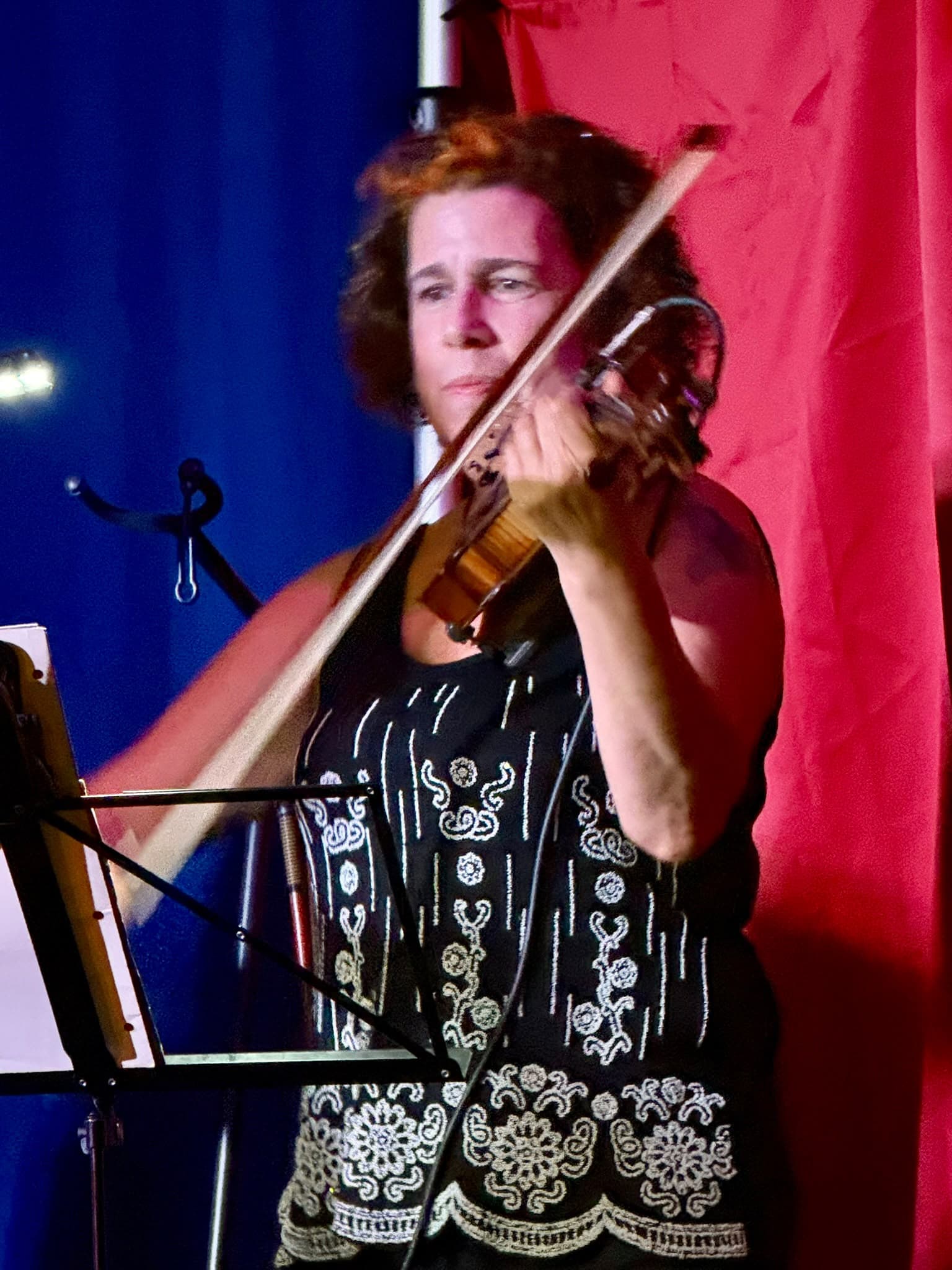 Violinist performing on stage